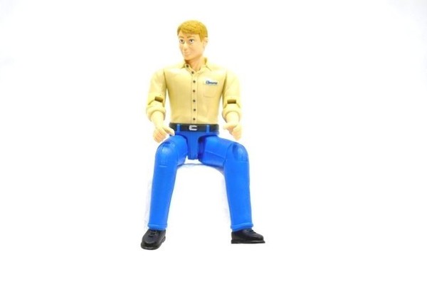 Figurka mężczyzny w niebieskich dżinsach