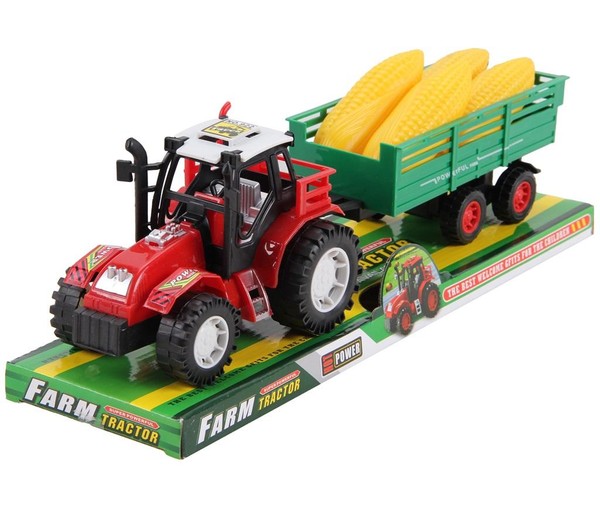 Traktor z przyczepą i kukurydzą